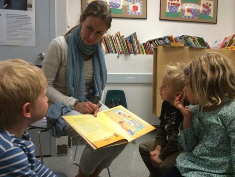 Teacher reading book