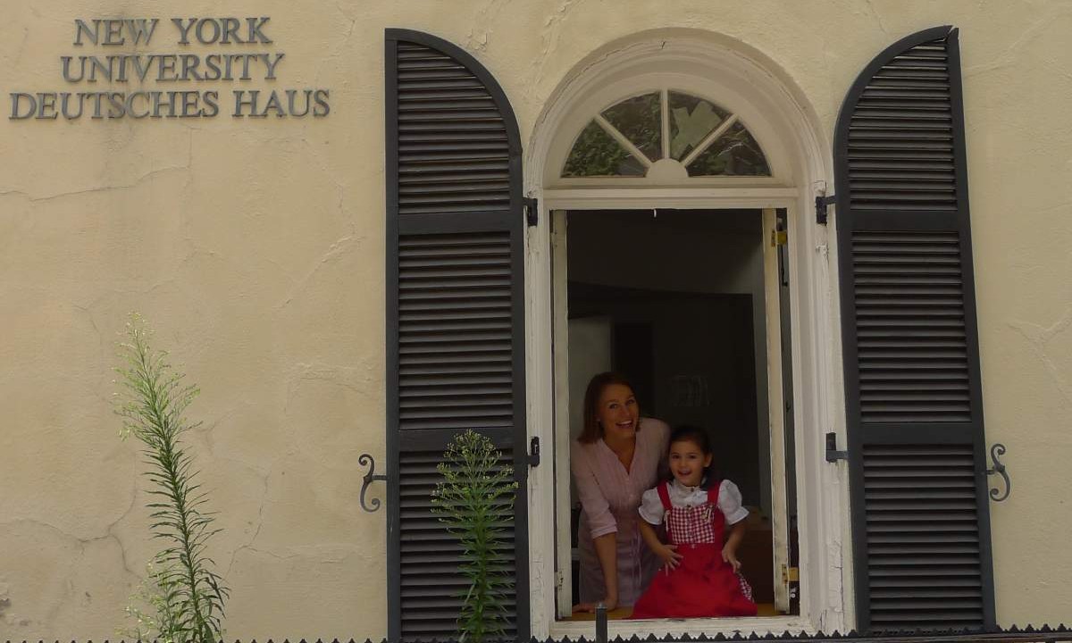 Child and teacher at Deutsches Haus NYU