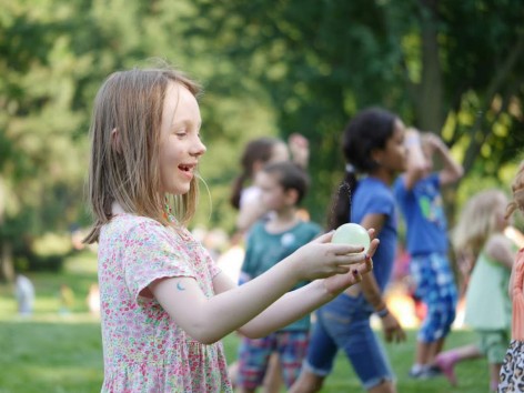 Girl laughing at Summer Picnic 2015 | CityKinder